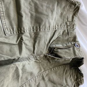 Green flare pants